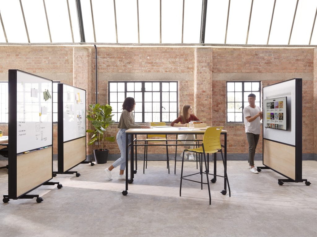 An office with ergonomic counter height chairs