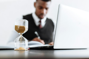 Person working at home: remote working checklist by Smart HR and Posture People